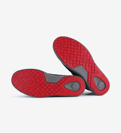 Red hi-grip soles of Baikal Boots by Pitas, showcasing durable waterproof design and traction from the Coast signature range.