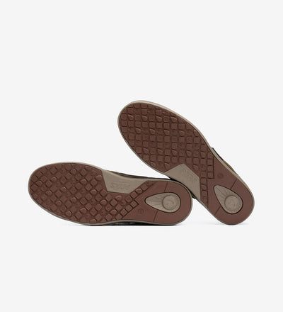 Non-slip rubber outsoles of Omi by Pitas waterproof suede casual shoes showing durable grip pattern.