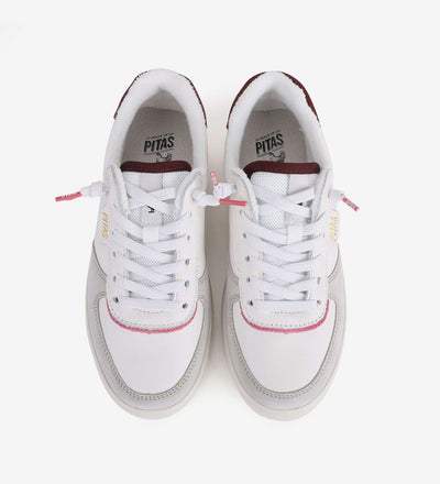 White Zan Leather Sneakers by Pitas with six lace eyelets and elastic laces, featuring a 4cm platform and water-repellent leather.